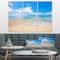Designart - Large Clouds Over Calm Beach - Seashore Photo Canvas Print